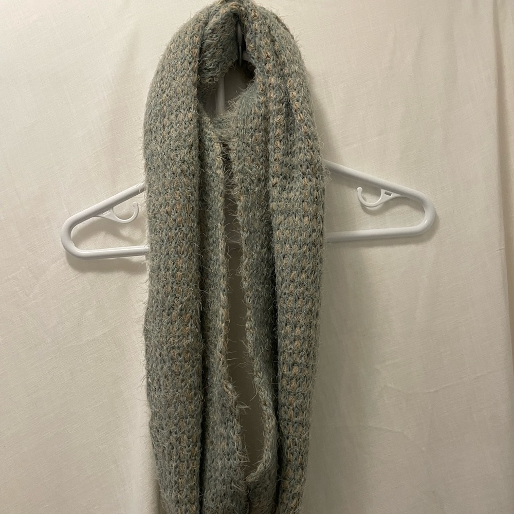 Simply Noelle infinity knit scarf.  Acrylic and nylon based. Blue and tan